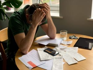 Legal experts at Marcadis Law Firm PA examining documents for fraudulent transfers.